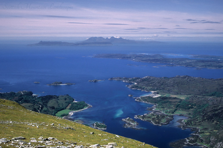 Looking over Loch Ailort, Lochnan Uamh and the Sound of Arisaig to Eigg and Rùm, from the west top of Rois-Bheinn.