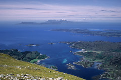 Looking over Loch Ailort, Lochnan Uamh and the Sound of Arisaig to Eigg and Rùm, from the west top of Rois-Bheinn.