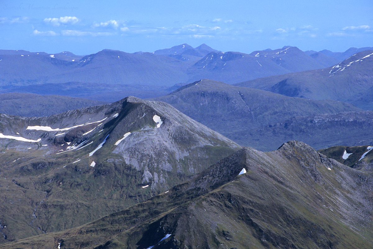 Na Gruagaichean, An Gearanach and An Garbhanach, from the summit of Ben Nevis. Na Gruagaichean, An Gearanach and An Garbhanach.