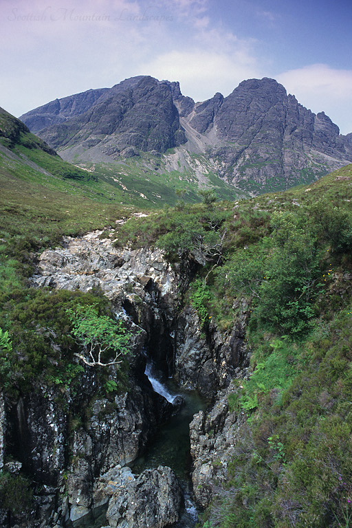Blà Bheinn, the highest of a group of hills known as the Cuillin Outliers, from the east. Blà Bheinn, the highest of a group of hills known as the Cuillin Outliers, from the east.