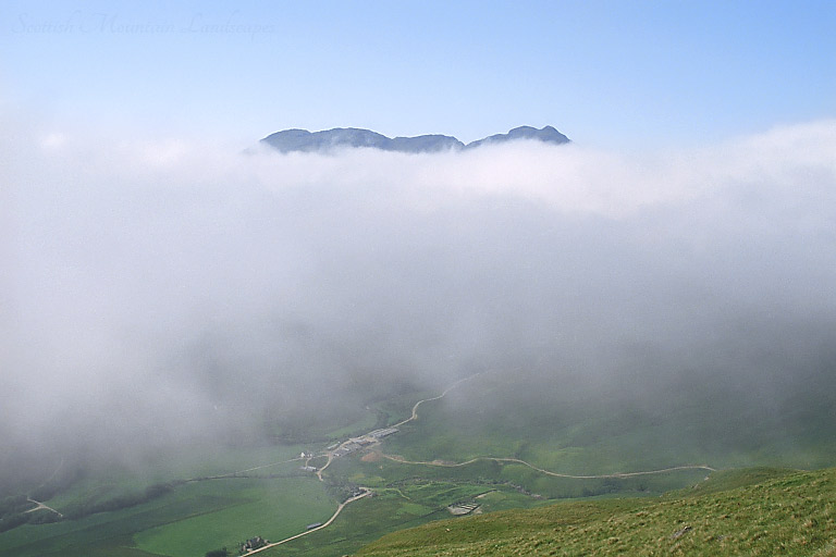The summit of Stob a'Choin above the clouds, from Stob Invercarnaig. The summit of Stob a'Choin above the clouds, from Stob Invercarnaig.