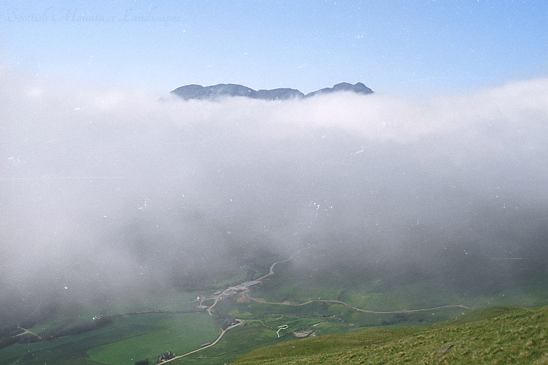 The summit of Stob a' Choin above the clouds, from Stob Invercarnaig. The summit of Stob a' Choin above the clouds, from Stob Invercarnaig.